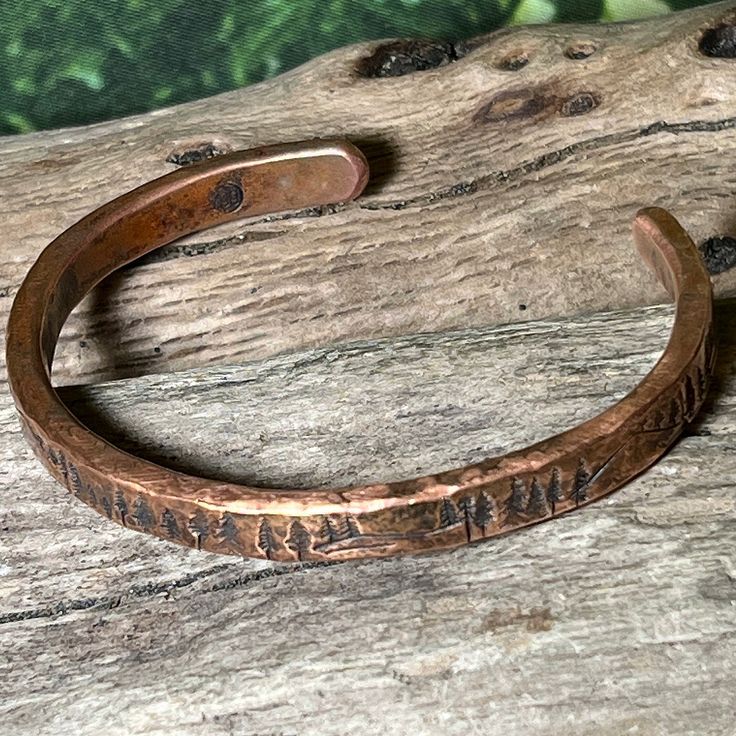 Handmade Rustic Bronze Bracelets, Rustic Stamped Cuff Bracelet Gift, Rustic Adjustable Bronze Bracelet, Rustic Adjustable Bronze Bracelets, Adjustable Rustic Bronze Bracelets, Rustic Brown Stamped Bracelets, Rustic Stamped Bracelets For Gifts, Rustic Stamped Bracelets For Gift, Adjustable Rust Bracelets For Gifts