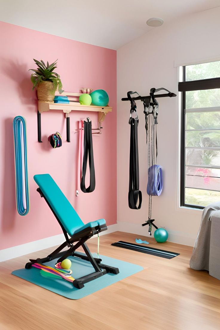 a room with pink walls and various exercise equipment