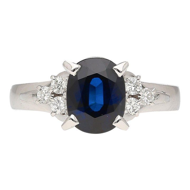 Natural 1.58 Carat Oval-Cut Blue Sapphire and 0.18 CTTW Round-Cut Diamond Filigree Setting in Platinum 900 Ring Size 6.  Details:  Item Type: Cocktail Ring Metal: Platinum 900 Size: 6 Setting: 4-Prong Weight: 5.70 Grams   Center Gemstone Details: Type: Sapphire Carat: 1.58 Carat Color: Blue  Cut: Oval  Measurements: 8 x 6.2 mm    Side Stones Details:  Type: Diamond  Cut: Round Cut Carat: 0.18 CTTW  This platinum blue sapphire ring features a 1.58-carat sapphire (8 x 6.2 mm) as the centerpiece, a Aquamarine Solitaire Ring, Gemstone Solitaire Ring, Sapphire Solitaire Ring, Gold Solitaire Ring, Sapphire Solitaire, Modern Ring, Filigree Ring, Sapphire Stone, Diamond Solitaire Rings