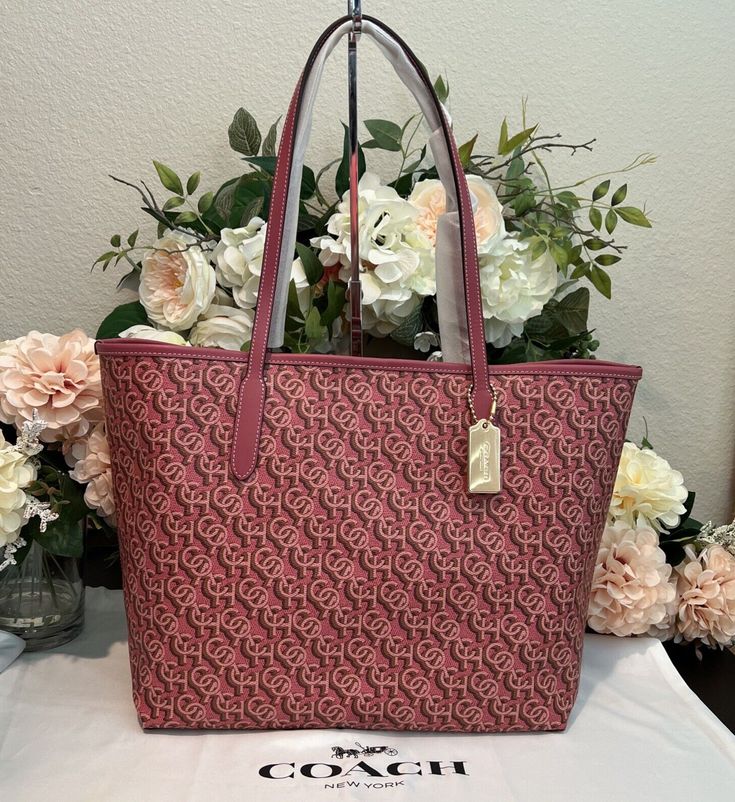 COACH CITY TOTE Double Handle Shoulder Bag~CF342 ROUGE PINK Monogram Print New with Tags 100% Authentic Please visit my store for other colors in the Monogram CITY TOTE and other City Tote patterns/colors available Coach color: IM/ROUGE PINK TOTE / SHOULDER BAG / SHOPPER / LAPTOP BAG Signature coated canvas with smooth leather details Inside zip pocket Snap closure Large enough for laptop and/or ipad Handles with 10" drop 13" (L) x 11 1/2" (H) x 6 1/4" (W) PLEASE REMEMBER TO CHECK OUT ALL MEASUREMENTS Stored in dedicated room in a smoke free and pet free environment ALL ITEMS ARE GUARANTEED 100% AUTHENTIC and BRAND NEW    *Please note that the color in pictures might differ slightly due to lighting, flash and screen resolution. Please check my other Ebay store items of Kate Spade New York, Luxury Large Capacity Pink Shoulder Bag, Luxury Pink Coated Canvas Bag, Pink Monogram Canvas Shoulder Bag For Travel, Designer Pink Coated Canvas Shoulder Bag, Pink Designer Coated Canvas Shoulder Bag, Designer Pink Coated Canvas Bag, Pink Monogram Canvas Shoulder Bag For Daily Use, Pink Monogram Canvas Shoulder Bag For Shopping, Luxury Pink Coated Canvas Shoulder Bag