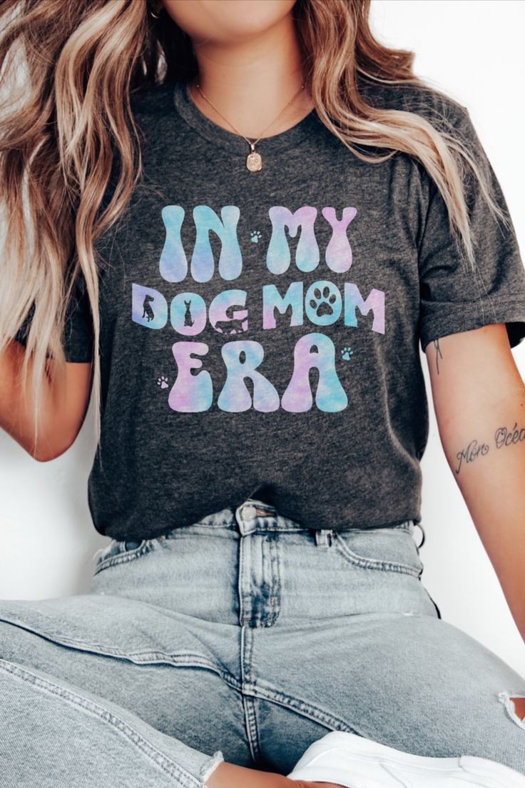 Calling all proud fur mamas! Show off your unconditional love for your four-legged babies with our adorable Dog Mom Shirt. This cute Bella Canvas brand tee is a must-have for any dog lover, letting the world know that your heart belongs to your canine companions. Whether you're out for a walk or simply cuddling up at home, this shirt is the paw-fect way to celebrate the joy, loyalty, and companionship that dogs bring. Share your dog mom pride and bond with fellow dog enthusiasts in style! Fur Mom Shirt, Fur Shirts, Dog Grandma, Fur Mom, Dog Shirts, Aunt Shirts, Mommy Shirts, Dog Mom Shirt, Dog Lover Shirt