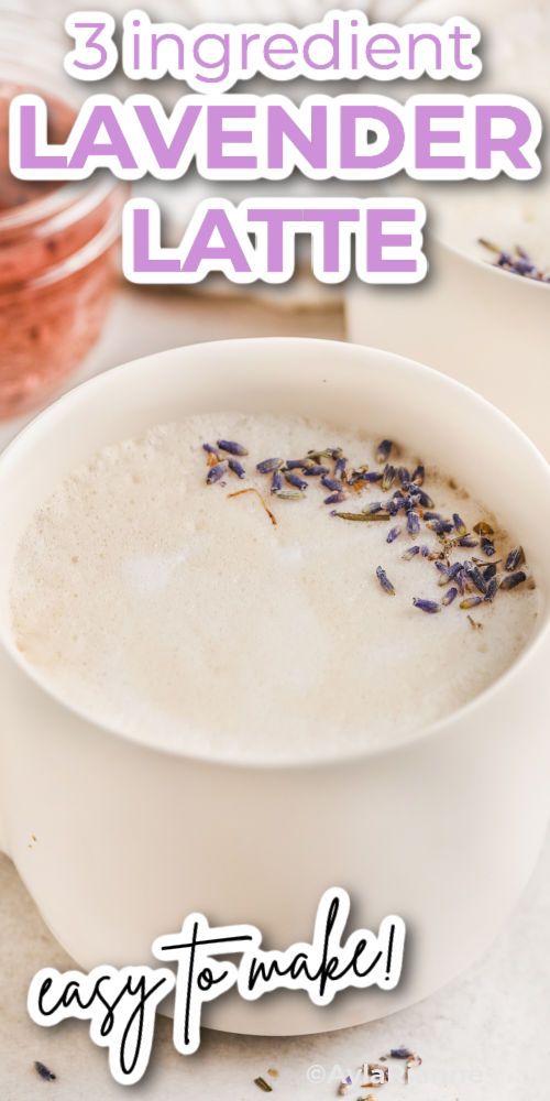 a white bowl filled with lavender latte on top of a table