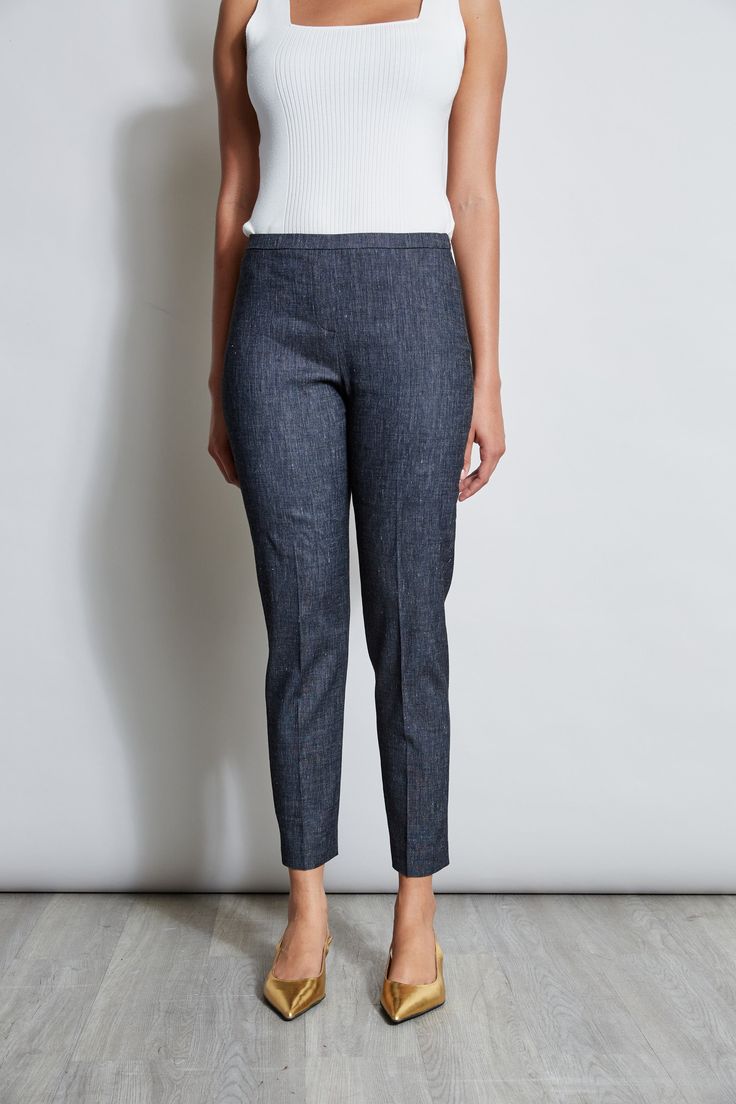 Our best-selling slim leg pant in sophisticated Italian Stretch Linen melange is perfect for dressing up with its matching jacket or pairing with Spring's new knits and shirts. Elie Tahari Exclusive Slim Fit Linen melange Pant 57% Linen, 26% Polyester, 14% Viscose, 3% Elastane Runs true to size. Model is 5'9" and wearing size S Measurements: Front Rise 10"L, Inseam 29"L (approx. length for size 6) Dry Clean Only Imported Style #: E4012204 Spring Business Casual Slim Fit Bottoms, Slim Fit Spring Jeans, Classic Stretch Denim Blue Bottoms, Fitted Jeans With Pockets, Ankle-length, Fitted Ankle-length Jeans With Pockets, Fitted Jeans With Pockets And Ankle-length, Fitted Ankle-length Jeans, Slim Fit Dark Wash Pants For Fall, Dark Wash Slim Fit Pants For Fall