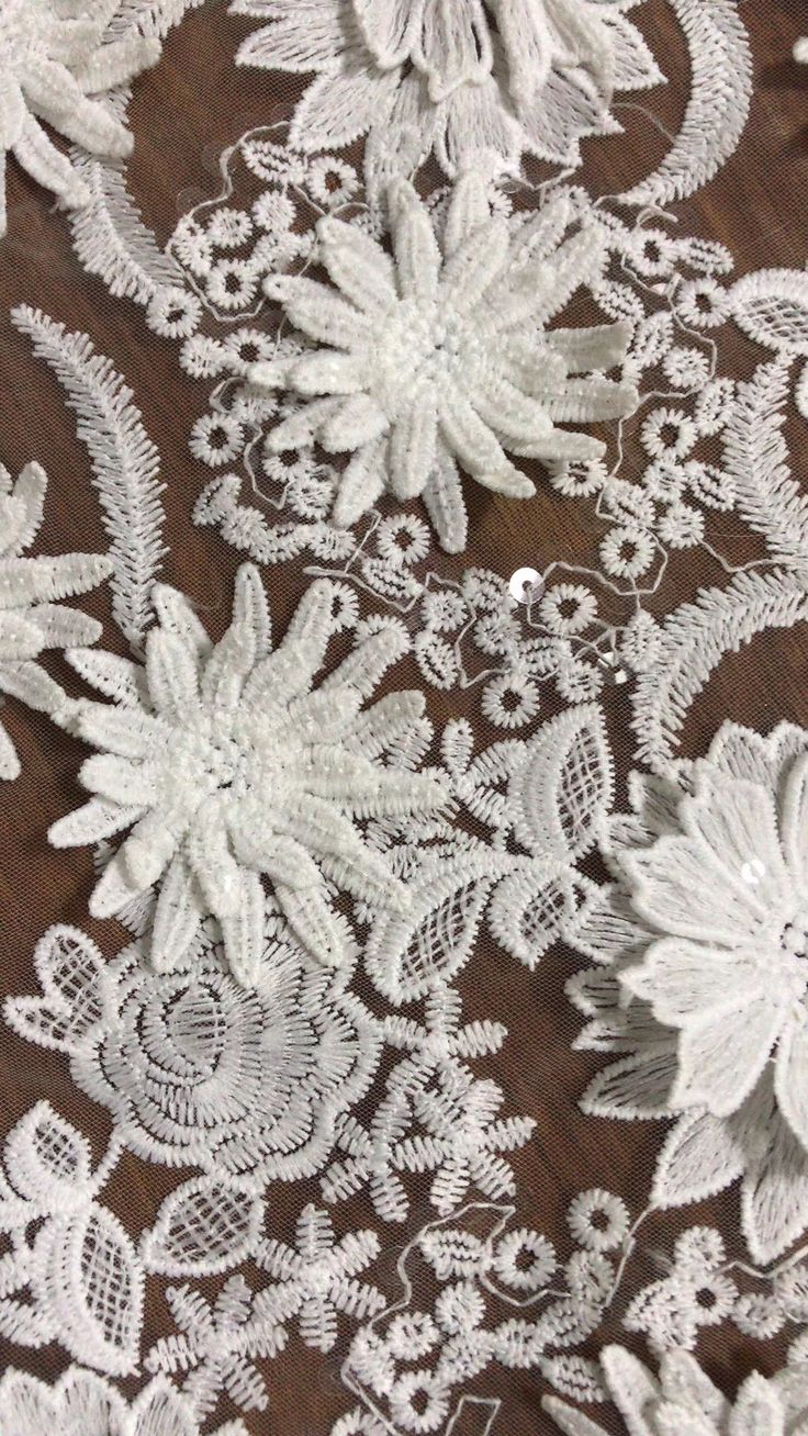 We offer a variety of fashion handmade fabric，those are widely use for wedding dress，garment and fashion cloth. we sell it by yard，our minimum order is 1 yards，and we always package it 15 yards for one roll，the width is 135cm/52 inch Material ： mesh ，Rayon,polyester. Symmetrical embroidery floral pattern, with lovely flowers in the middle, scalloped border. You can also cut and use separately. Perfect for dress, tops, wedding veil. You can split the piece up and have one scalloped edge around th White Party Dress With Appliques, Elegant Lace Sequin Fabric With Floral Applique, Elegant White Sequin Fabric With Floral Applique, Fitted Lace Tulle Fabric With Floral Applique, White Sequin Fabric With Floral Embroidery For Party, White Lace Tulle Fabric With Sequins, Elegant White Tulle Fabric With Appliques, White Embroidered Fabric With Floral Applique For Party, White Embroidered Fabric With Appliques For Party