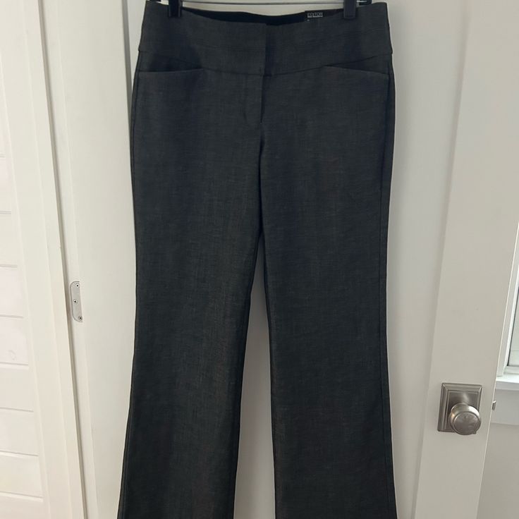 Beautiful Express Editor Dress Pants Sz 6r New With Tags $88 Wide Waistband Flare Leg Poly/Cotton/Viscose And Elastane In A Beautiful Heather Charcoal Gray All Measurements Taken Flat Across In Inches Waist: 18.75 Rise: 9 Inseam: 32.25 Leg Opening: 10.75 Questions? Please Message Me From A Clean, Smoke Free Home Fitted Dress Pants For Spring Workwear, Mid-rise Fitted Business Bottoms, Fitted Mid-rise Formal Pants, Fitted Dress Pants For Spring Office Wear, Formal Fitted Mid-rise Pants, Fitted Wide Leg Career Bottoms, Fitted Casual Workwear Dress Pants, Fitted Casual Work Dress Pants, Casual Fitted Dress Pants For Workwear