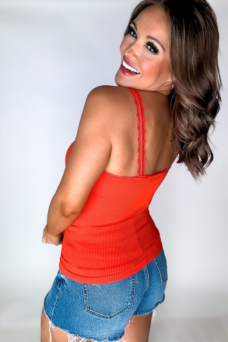 Add a pop of fun to your wardrobe with our Stretchy Ribbed Seamless Lace Trim Tank Top. The smoothing compression ribbed material will keep you looking sleek and the lace straps and trim add a touch of playful elegance. Available in multiple colors for all your fashion needs! Fit: She is wearing her true size medium. Fits true to size. If in between sizes, size down. Lace Trim Tank Top, Lace Straps, Lace Trim, Sleek, Tank Top, Size Medium, Trim, Tank Tops, Wardrobe