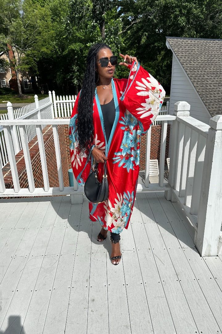 Rich Auntie at it's finest! Our fashion satin kimono can be worn as an oversized dress on it's own or cinched at the waist for a more fitted look. Flowy and colorful style definitely can make this a beach coverup or vacation look. In One Size fits most as the sleeves are open flowy and the kimonos have an open front. Size US Size One Size Red Oversized Dress For Spring, Red Oversized Spring Dress, Oversized Red Spring Dress, Spring Satin Kimono With Kimono Sleeves, Red Long Sleeve Kimono For Spring, Casual Red V-neck Kimono, Long Red Kimono For Vacation, Red Open Front Kimono For Summer, Red Loose Fit Kimono