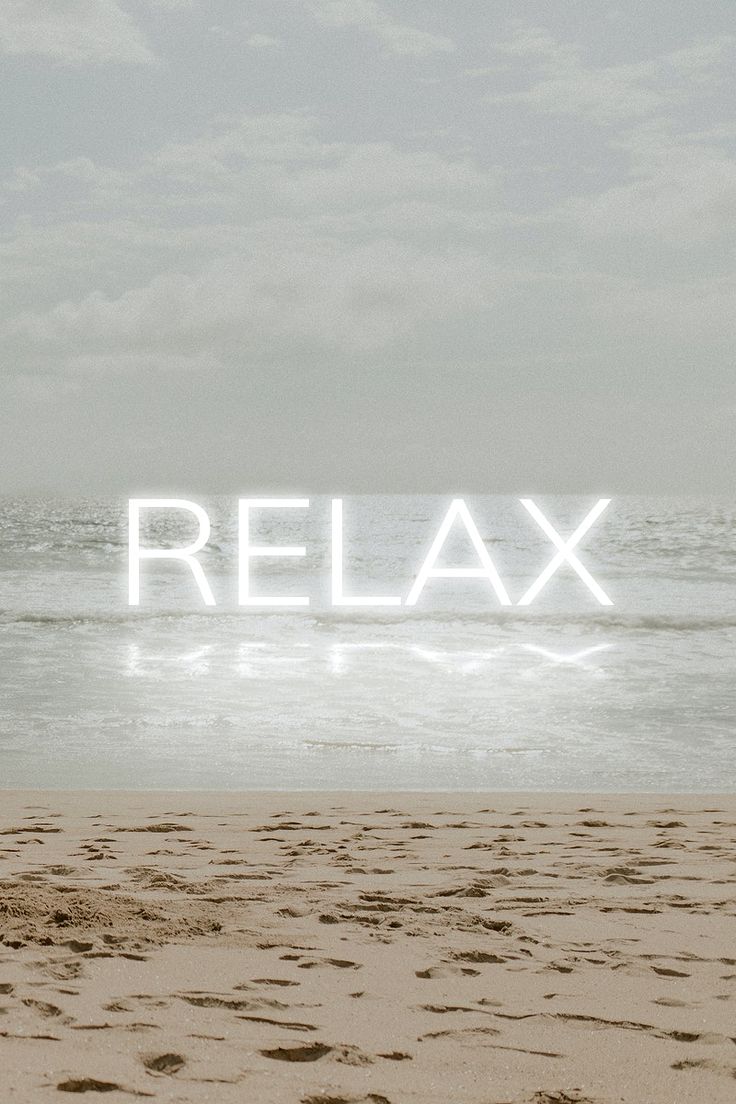 a beach scene with the word relax written in white