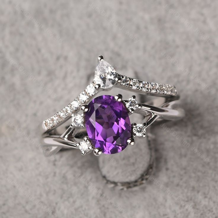 Ring details metal: silver/14k white(rose/yellow) gold center stone: oval shape 6*8mm (1.14ct) amethyst accent stone: cz NOTE: if it is silver or white gold, it will be get plated with rhodium Customization is available you can change, add or remove any parts of the ring if you have good idea. I can add special engraving inside the shank of the ring by free (words, date, simply simbles and so on) too. I am happy to help out or make any adjustments to your order if you have a special request. Pro Oval Cubic Zirconia Stackable Rings With Prong Setting, Oval Cubic Zirconia Stackable Rings In Fine Jewelry Style, Formal Oval Gemstone Stackable Rings, Oval Gemstone Stackable Rings For Formal Occasions, Oval White Gold Stackable Rings With Cubic Zirconia, Oval Amethyst Promise Ring In White Gold, White Gold Amethyst Promise Ring With Oval Shape, White Gold Oval Amethyst Promise Ring, Oval Diamond Ring In White Gold With Gemstone Accents