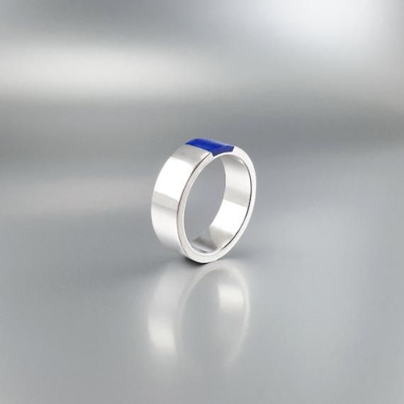 "Modern band ring Lapis Lazuli and Sterling silver inlay. Unique gift for her, girlfriend, friend, wife, mom, September and October birthstone, 8 year anniversary. Beautiful ring with a design of simplicity and modern elegance. The stone is set in the middle of the Sterling silver band. This beautiful ring is worked with the technique of inlay, which means the stone is worked seamlessly into the Sterling silver. All our stones are natural stones and our jewelry is handmade, slight differences in Modern Silver Jewelry With Birthstone, Modern Blue Sapphire Ring Hallmarked, Modern Open Band Jewelry As A Gift, Modern Open Band Jewelry Gift, Modern Sapphire Ring Gift, Modern Round Sapphire Ring Gift, Modern Round Sapphire Ring As Gift, Sterling Silver Jewelry With Polished Edges, Sterling Silver Jewelry With Polished Edges For A Wedding