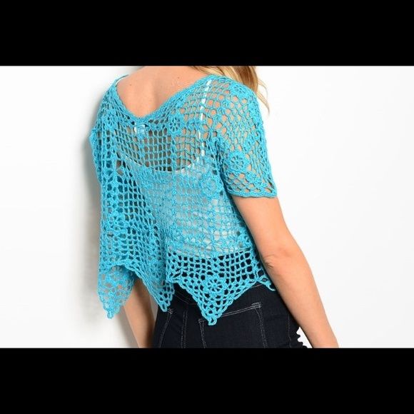 CUTE BLUE CROCHET TOP Love this cute blue short sleeve top for summer. Features a crochet design and scalloped hem.  Fabric Content: 55% COTTON 45% POLYESTER  Size measurements-- L: 18" B: 20" W: 20". This is a one size fits small to large Tops Fitted Blue Lace Top For Summer, Blue Crochet Lace Top, Blue Lace Crochet Top, Blue Bohemian Lace Top, Blue Lace Top For Summer, Blue Lace Crochet Top For Summer, Blue Lace Tops For The Beach, Blue Bohemian Crochet Top, Blue Crochet Tops For Vacation