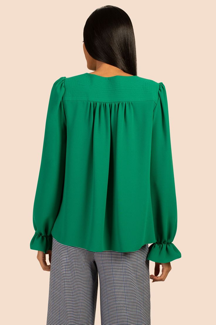 JANA TOP – Trina Turk Elegant V-neck Blouse For Fall, Elegant V-neck Long Sleeve Top For Work, Fall V-neck Blouse With Pleated Sleeves, V-neck Blouson Sleeve Work Tops, Chic Viscose Blouse, Fitted Long Sleeve Top For Work, Solid Color Fall Blouse For Work, Fall Workwear Blouse With Blouson Sleeves, Fall Date Night Blouse With Blouson Sleeves