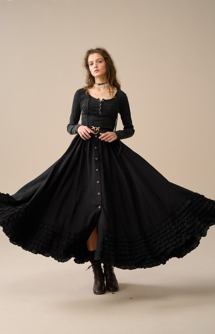 Step back in time with our Victorian Style Skirt, where every stitch reflects exceptional craftsmanship. Revel in the elegance of this skirt adorned with a graceful flare that flows seamlessly as you walk or dance, creating a captivating presence at the Renaissance Festival or any historical event.  You'll be pleased with these ruffles. Why not pair it with a simple, casual blouse and let this skirt be the focal point of your look. 【Fabric】 100% linen. 220g/gram. thick weight. It is washed with special technique and not easy to wrinkle. 【Size】 *SIZE XS waist: 26"/ 65 cm *SIZE S waist: 27"/ 70 cm *SIZE M waist: 29/ 75 cm *SIZE L waist: 31.5" / 80 cm SIZE XL Waist: 33"/ 85cm SIZE XXL waist : 35" / 90 cm SIZE 3XL waist : 37" / 95 cm Flowy Ruffled Maxi Full Skirt, Bohemian Black Maxi Skirt, Bohemian Long Dress For Fall, Bohemian Long Skirt Dress For Fall, Bohemian Midi Dress With Ruffled Skirt, Black Bohemian Dress With Flowy Skirt, Fall Dresses With Ruffled Long Skirt, Fall Long Skirt Dress With Ruffles, Gothic Flowy Black Maxi Skirt