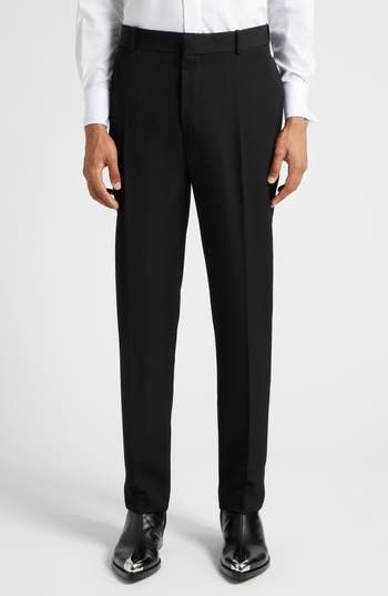 Tailored elegance pervades Italian-crafted trousers fashioned from smooth wool with cleanly pressed creases and a flat front. 34" unhemmed inseam; 14" leg opening; 11 1/2" front rise; 15 1/2" back rise (size 48 EU) Zip fly with hook-and-bar closure 100% wool Dry clean Made in Italy Men's Designer Clothing Tailored Semi-formal Bottoms In Suiting Fabric, Luxury Tapered Leg Dress Pants For Semi-formal Occasions, Luxury Straight Leg Dress Pants For Semi-formal Occasions, Business Straight Pants In Suiting Fabric, Luxury Business Casual Pants With Pressed Crease, Elegant Straight Fit Formal Pants, Tailored Full Length Sleek Pants, Semi-formal Straight Leg Suiting Bottoms, Semi-formal Straight Leg Suiting Fabric Bottoms