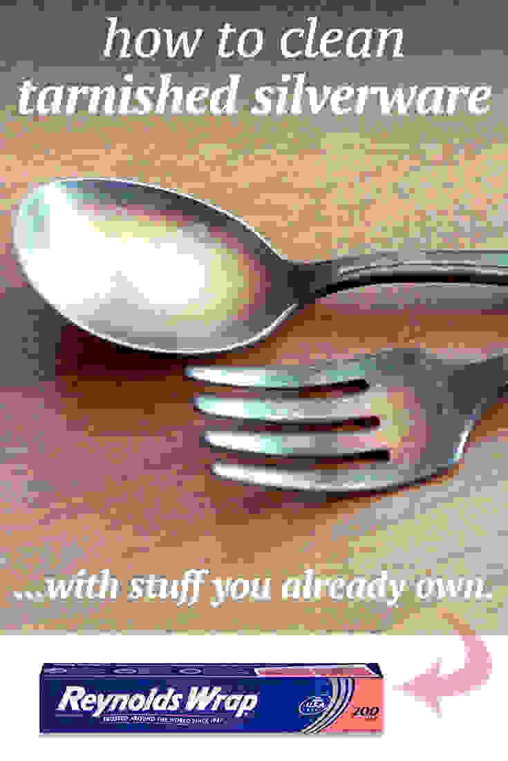 an ad for silverware with a fork and spoon on it's side that reads, how to clean tarnished silverware with stuff you already own