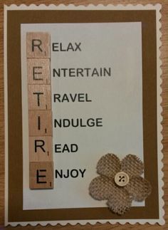 a close up of a wooden block with words on it and a flower in the middle