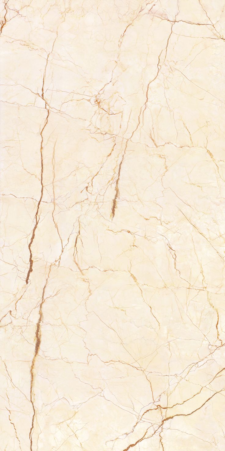 a white marble textured surface with brown lines