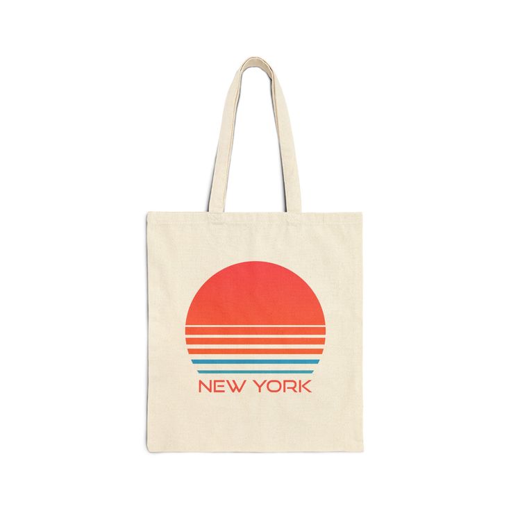 DEC 12 IS THE FINAL DAY TO ORDER FOR CHRISTMAS DELIVERY FOR MOST ITEMS *There are certain items I can see get to you for Christmas past the 12th, but please reach out prior to ordering if you need your item for Christmas and order after the 12/12.* This 100% cotton New York bag comes in one - 15" x 16"- perfect for everyday wear. This New York tote is great for a trip to the gym, beach or store, it's durable and will last for years. The New York bag features 20" handles (made from the same canva Retro Travel Bag With Graphic Print, Casual Cotton Canvas Bag For Weekend, Retro Travel Shoulder Bag With Letter Print, Retro Shoulder Bag With Letter Print For Travel, Summer Graphic Print Cotton Canvas Bag, Summer Cotton Bags With Graphic Print, White Cotton Canvas Bag For Weekend Trips, White Cotton Bag For Weekend Trips, Rectangular Cotton Canvas Bag For Weekend Trips