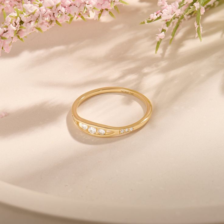 Open the doors of a sophisticated world with Eye Line Ring. This elegant piece combines the timeless appeal of 14K gold with carefully placed captivating sparkle. The elegant design elegantly follows the natural curve of your finger, creating a captivating visual journey. Adorn yourself with this timeless piece and let your style shine with every look. - Made in 14k solid gold - Decorated with handset white cubic zirconia stone on solid gold - Top Width: 3.20 mm / 0.125 inches- Bottom Width: 0.9 Luxury Jewelry Brands, Gold Sun, Pear Engagement Ring, Twist Ring, Knot Ring, Gold Top, Vintage Band, Dream Ring, Pinky Ring