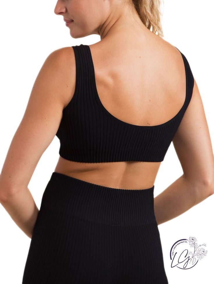 This seamless sports bra sits just on top of the rib cage. It features a seamless construction, an all-over ribbed texture, and a round scoop neckline on both the front and the back. Fabric: 92% Nylon & 8% Spandex. Seamless technology. Moisture-wicking. Four-way stretch. Sporty Ribbed Scoop Neck Sports Bra, Sports Ribbed Scoop Neck Sports Bra, Ribbed Scoop Neck Sports Bra In Athleisure Style, Athleisure Ribbed Scoop Neck Sports Bra, Ribbed Scoop Neck Crop Top For Yoga, Ribbed Seamless Sports Bra For Sports, Ribbed Seamless Sports Bra, Seamless Ribbed Sports Bra, Ribbed Seamless Sports Bra For Workout