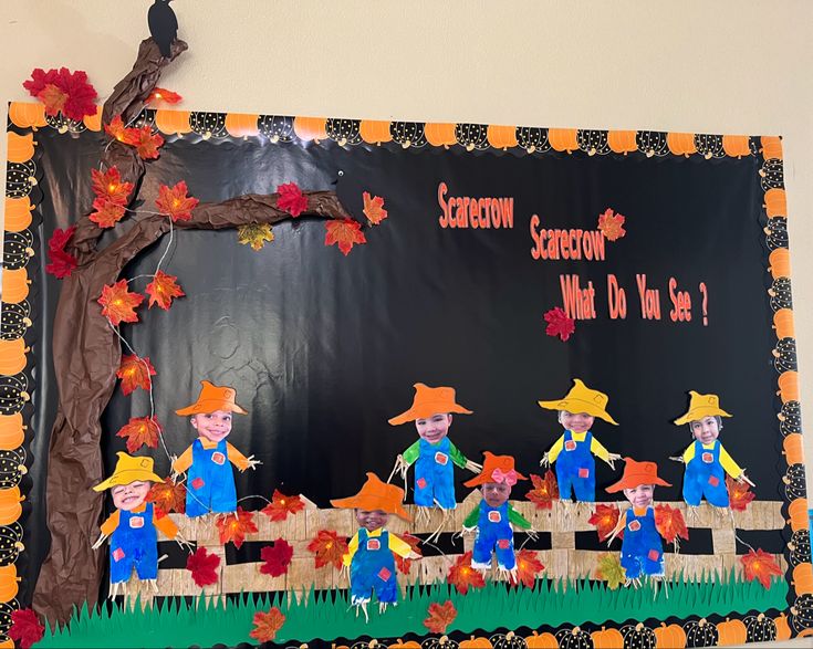 a bulletin board with scarecrows on it