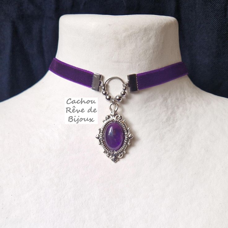 Victorian style choker necklace with natural amethyst stone and perfectly matching velvet. -------------- Details ---------------- - Amethyst: Oval cabochon in natural stone, domed and polished, 13x18mm - Color: Dark and intense purple - Antique silver metal Victorian pendant: 52x26mm - Tone-on-tone purple velvet choker, stainless steel beads and findings: 32-39cm with the extension to adjust to your liking (contact me for another length) ------------- Virtues ----------------- Amethyst is a hea Victorian Choker, Purple Choker, Match Velvet, Victorian Pendants, Choker Pendant, Velvet Choker, Purple Velvet, Amethyst Stone, Victorian Style