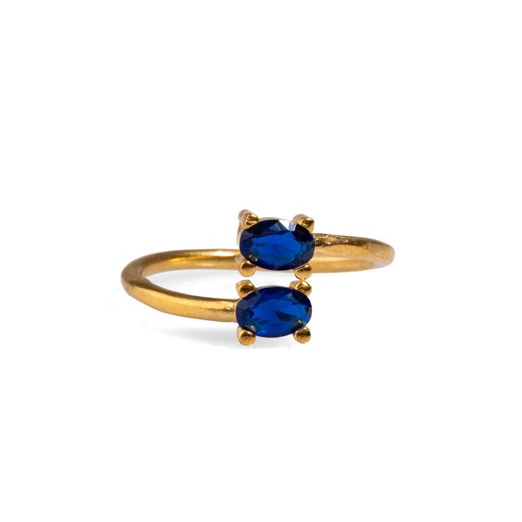 Double Sapphire Stone & Gold Dainty Adjustable Ring, designed for both elegance and versatility. Crafted with 24k gold plating on brass, this adjustable ring showcases two striking sapphire stones placed on opposite ends, creating a chic yet minimalist look. Perfect for daily wear, this ring can be worn alone or effortlessly stacked with your other favorite rings. Whether you're dressing up or down, this timeless piece adds a touch of sophistication to any outfit. Details Crafted with high-quali Double Rings, Sapphire Stones, Forever Jewelry, Jewelry Ring Box, Stone Gold, Men's Jewelry Rings, Sapphire Stone, Mens Jewelry Bracelet, Favorite Rings