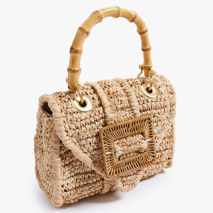 Timeless and posh, Pamela Munson’s straw accessories are beloved by island hoppers and city dwellers alike. Her bags reinterpret straw as a natural, sustainable material that can be worn any season, anywhere. Finally, a gold minaudière that goes with everything. This handwoven raffia handbag is expertly crafted and beautifully finished with brushed gold mini hardware, bamboo and rattan. Every detail is considered with special attention to function and versatility. Named after Pamela’s grandmothe Beige Top Handle Straw Bag With Gold-tone Hardware, Beige Straw Bag With Gold-tone Hardware And Top Handle, Beige Rectangular Straw Bag With Gold-tone Hardware, Straw Top Handle Bag With Gold-tone Hardware, Rectangular Straw Bag With Gold-tone Hardware, Beige Straw Bag With Gold-tone Hardware, Natural Straw Bags With Gold-tone Hardware, Chic Gold Straw Bag, Beige Crochet Straw Bag With Bamboo Handle