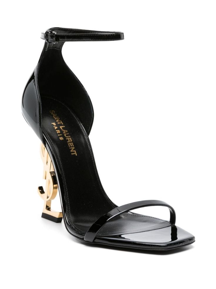 Find SAINT LAURENT Opyum 110mm Ysl Heel Sandals on Editorialist. Black leather Opyum 110mm YSL heel sandals from Saint Laurent featuring an open toe, a branded insole, an ankle strap with a side buckle fastening and a sculpted YSL high heel. Ysl Sandals, Ysl Heels, Black Sandals Heels, Sandals Black, Designer Heels, Lookbook Outfits, Heel Sandals, Black Design, Makeup Routine