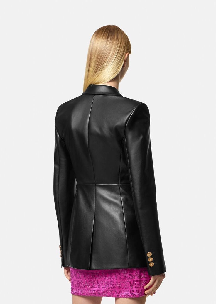 This single-breasted leather blazer is accented by Medusa hardware and has peaked lapels and a structured silhouette. Luxury Black Blazer Dress For Business, Designer Double Button Business Blazer, Designer Business Blazer With Double Button Closure, Designer Double Button Blazer For Business, Luxury Blazer With Double Button And Lapel Collar, Luxury Blazer With Double Button Closure And Lapel Collar, Chic Fitted Sport Coat With Double Button Closure, Designer Evening Blazer With Double-breasted Buttons, Luxury Double-breasted Blazer With Hidden Buttons