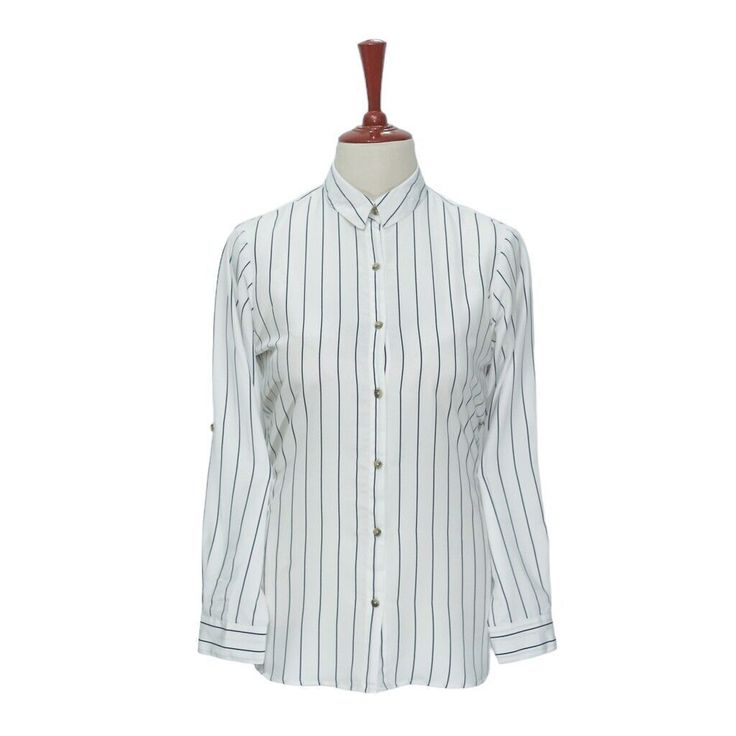 Experience The Perfect Comfort And Feel Of Premium Quality Polyester In This Modern Classic. Hand Sewn For The Classic Lady, This Long Sleeve Shirt Features A Full Button Front, One-Button Barrel Cuffs, Spread Collar And Bone Buttons. Choose This Shirt For Everyday Wear Or For Parties And Elegant Events. Match It With Jeans, Chinos Or Dress Pants For A Polished, Sleek Look. Buy It For Yourself, Or Gift It To A Loved One For An Anniversary, Holiday, Birthday Or Just Because. Details: Color: White Silky Shirt, Casual Tunics, Holiday Birthday, Shirt Button, Sleek Look, Blue Pattern, Modern Classic, Hand Sewn, Dress Pants