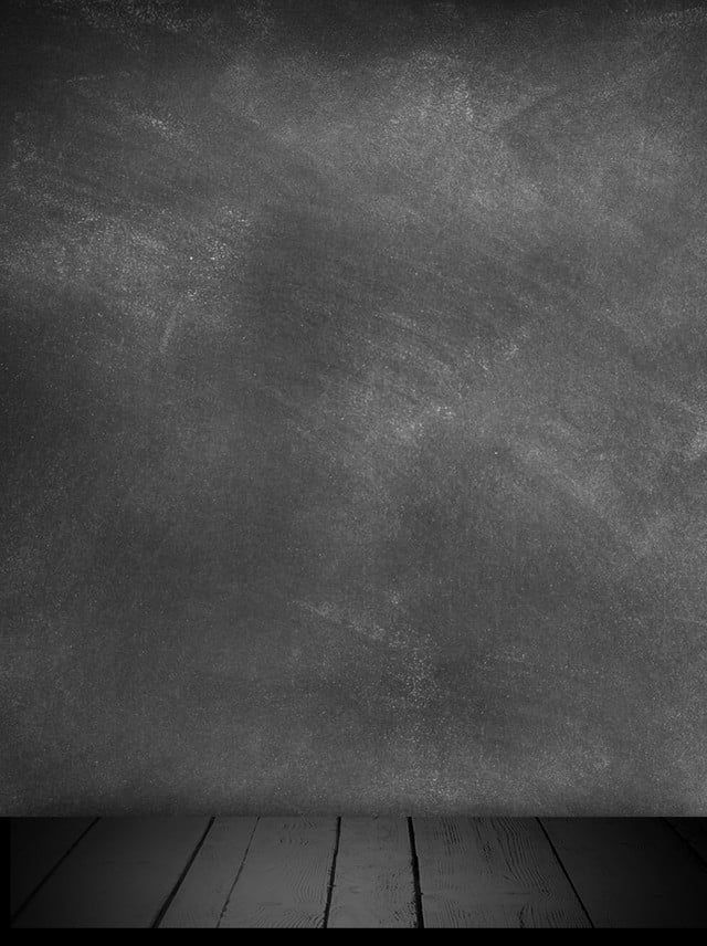 a black and white photo of an empty room with wood flooring in front of a chalkboard wall