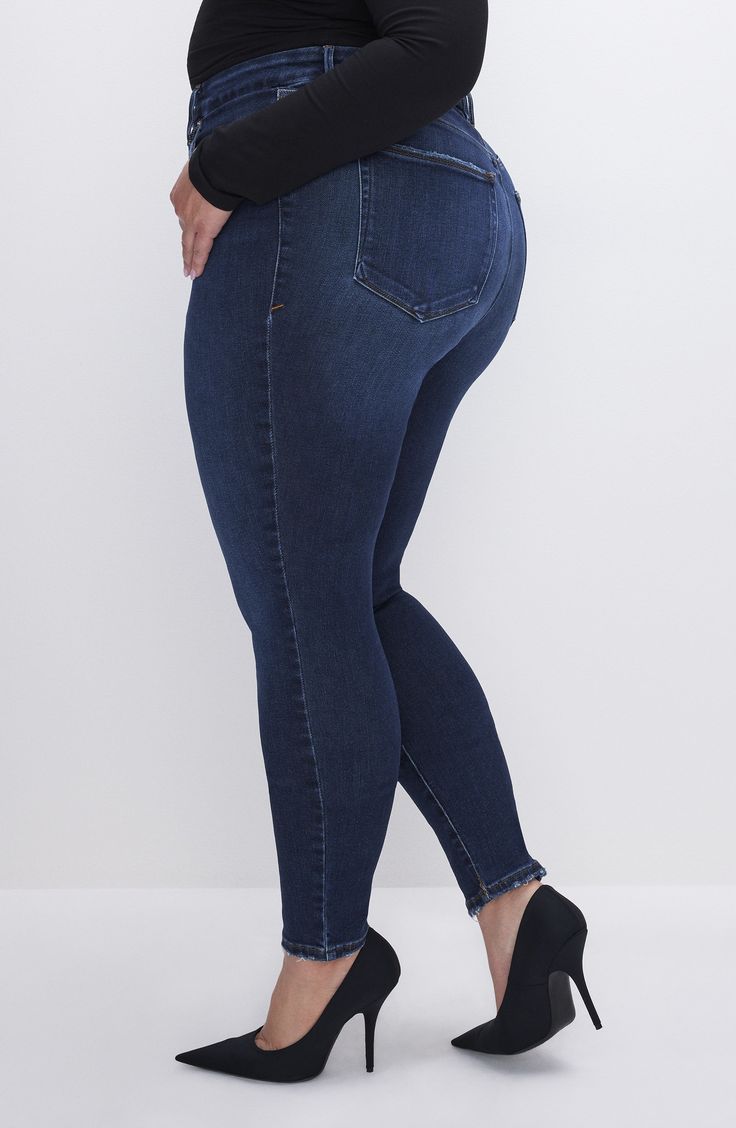 These skinny jeans are made from stretchy denim with exposed buttons that spotlight its gap-proof, contoured high waist. LycraXFit technology brings four-way stretch to the denim so you can move seamlessly throughout your day. 29" inseam; 10" leg opening; 11 1/2" front rise; 15 1/2" back rise (size 10) Exposed-button fly Five-pocket style 93% cotton, 5% Lycra® elastomultiester, 2% Lycra® spandex Machine wash, tumble dry Imported Black Owned/Founded Stretch Dark Wash Pants With Button Closure, Stretch Dark Wash Bottoms With Button Closure, Stretch Bottoms With Button Closure In Dark Wash, High Rise Stretch Jeggings With Button Closure, Stretch High Rise Jeggings With Button Closure, High Rise High Stretch Elastane Jeans, Stretch Denim Blue Jeans With Button Zip Fly, High Stretch High Waist Dark Wash Jeans, High Stretch High Rise Elastane Jeans