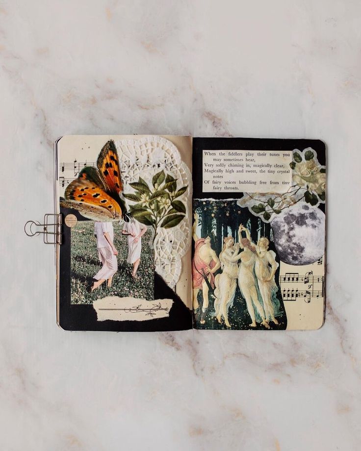 an open book with images of people and animals on the pages is sitting on a marble surface