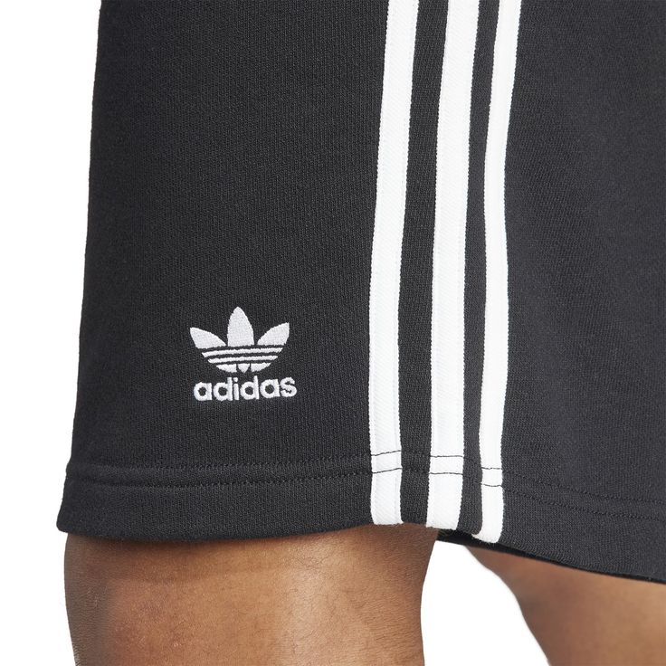 Three stripes for the win! In the adidas 3-Stripe Men's Shorts, you'll be repping your brand with these shorts that are so obviously adidas with their three-stripes. The elastic waistband means they'll stay up well but doesn't require you to be uncomfortable with a button or tight fit. These are ideal for on and off the court and are easy to match with a tee or even a hoodie (if you're into that look in the winter).Features: Features three stripes down side. Has adidas logo on the leg. Elastic w Adidas Clothing, Sports Field, White Kicks, Just Style, Adidas Outfit, Adidas Shorts, Designer Shorts, Short Jacket, Striped Shorts