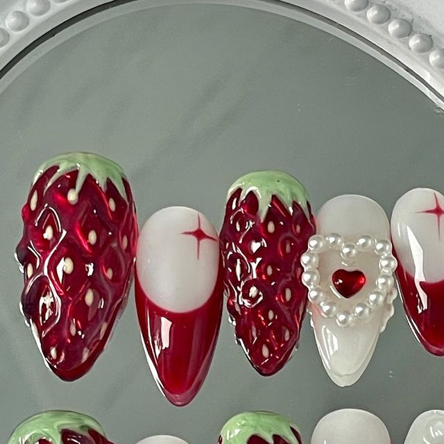 Press On Nails Australia | Custom Made To Order on Instagram: "Strawberry hour set 🍓 😋 Nom nom get in my belly the most specious set ever!! Available to custom order on our website ~ Tutorial inspo from @juliettesprettysets  on tik tok 🙌🏻   • • •  #presson #pressonnails #naildesign #nailart #nailinspo #nailinspiration #nailtech #pressonnailbusiness #pressonsets #nailartist #nailsaustralia #stickonnails  #customnails #custompressonnails #miffynails #y2k #prettynails #cutenails #kessiistudio #customnails #custompresson #naildesigns #strawberrynails #cutestrawberrynails #coquettenails #bownails#3Djellygel #australiapressons #australianails #customdesignnails" Strawberry Inspo Nails, Diy Cute Nails, Nail Inspo Strawberry, Nail Ideas Strawberry, Gel X Nail Designs 2024, Diy Press On Nails How To Make, 3d Strawberry Nails, Handmade Press On Nails, Nail Sets Ideas