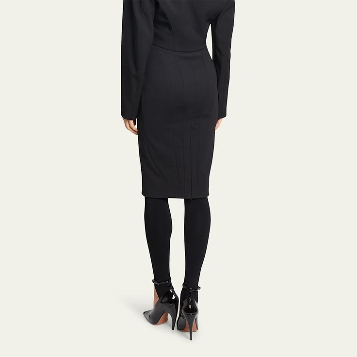 ALAIA hourglass pencil skirt features two-row button front  High rise  Hem hits around the knee Knee length  Pencil style Virgin wool Made in Italy Fitted Midi-length Bottoms For Office, Fitted Skirt Suit With Button Closure For Work, Classic Fitted Midi Pencil Skirt, Fitted Knee-length Pencil Skirt For Formal Occasions, Fitted Midi Pencil Skirt For Business Casual, Fitted Midi Length Skirt For Office, Sleek Fitted Midi Skirt, Modern Knee-length Pencil Skirt For Formal Occasions, Office Knee-length Pencil Skirt