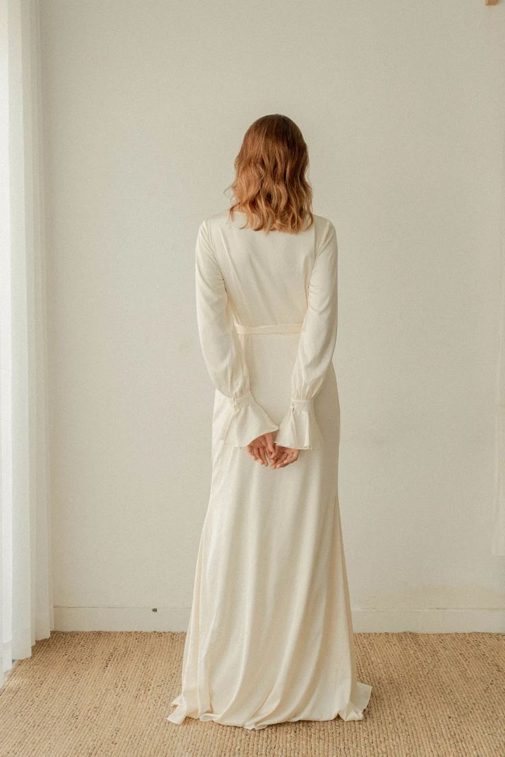 Dakota Off-white Long Sleeves Wrap Dress / Floor Length Satin | Etsy Beige V-neck Maxi Dress For Wedding, Cream Long Sleeve Maxi Dress For Wedding, Fitted Maxi Length V-neck Wedding Dress, Fitted Long Sleeve Wrap Dress For Wedding, Elegant White Wrap Maxi Dress, White V-neck Wrap Dress For Formal Occasions, Fitted V-neck Surplice Neckline Dress For Wedding, V-neck Bias Cut Maxi Dress For Weddings, Cream V-neck Wedding Dress