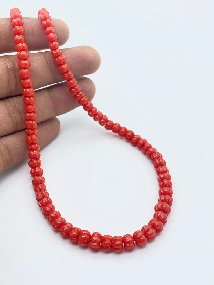 AAA Quality Coral Gemstone Melon Beads, Pumpkin Shape Coral Beads, Natural Rondell Carving Beads Coral Carved Melon Beads Necklace ★ Gemstone - Coral ★ Type - Natural ★  Style - Carved Melon Beads ★ Color - Show as Picture ★ Beads Size - 5 To 7 MM Approx. ★ Necklace Length - 14 To 24 Inch ★ Adjustable - 1 Inch External ★ Quality - AAA Handmade ( Measurement and Weight are close to approximations.) THANK YOU FOR VISIT Coral Beaded Necklaces, Orange Beaded Necklaces With Oval Spacer Beads, Orange Spacer Beads, Orange Round Spacer Beads, Traditional Coral Beaded Necklaces, Orange Faceted Oval Beads Necklace, Coral Necklaces With Faceted Round Beads, Orange Spacer Beads For Jewelry Making, Coral Beads For Jewelry Making