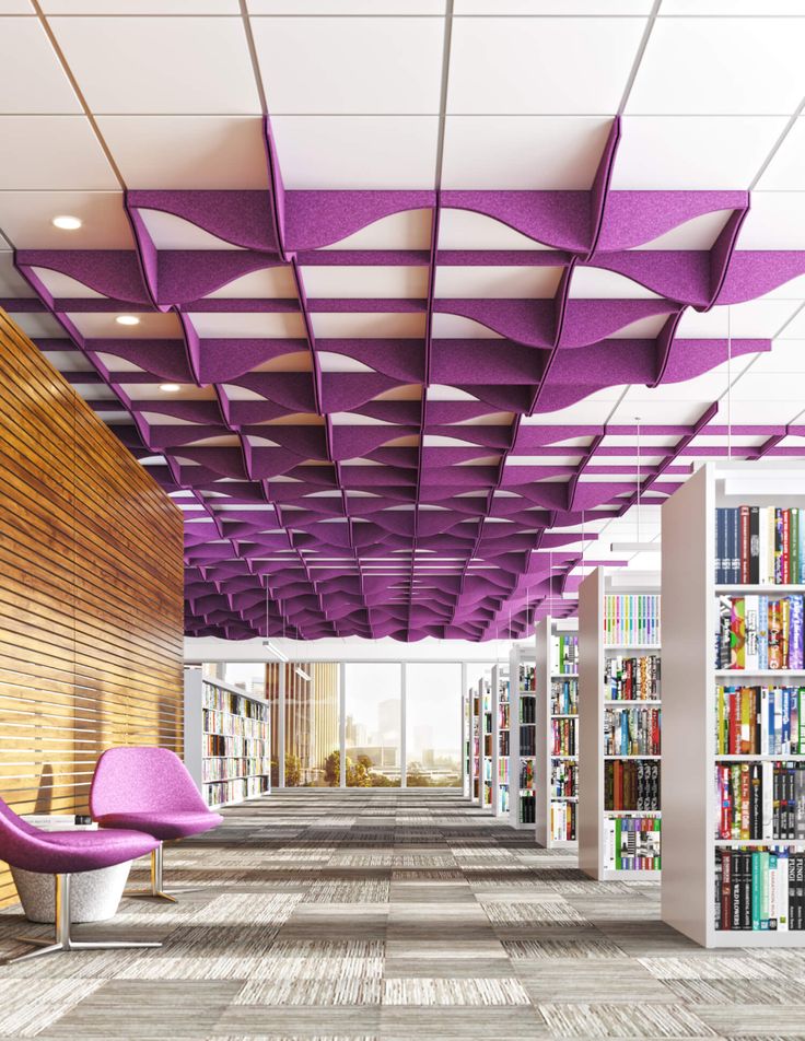 an empty library with purple chairs and bookshelves in the background, 3d rendering