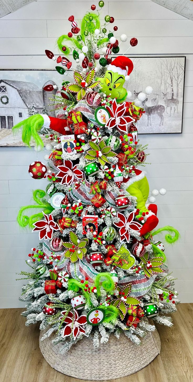 a christmas tree decorated with green and red ornaments