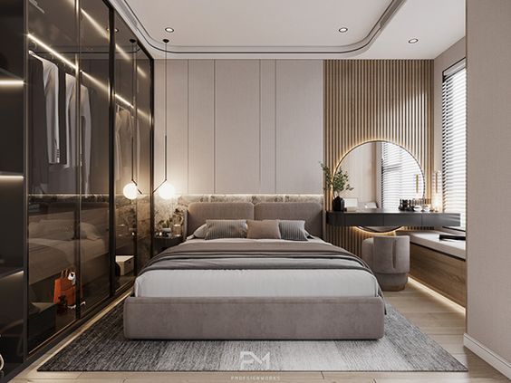 a bedroom with a large bed in the middle and lots of closet space behind it