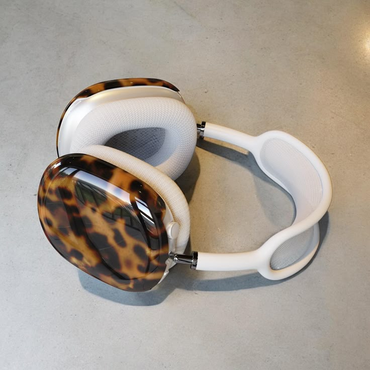 a pair of headphones sitting on top of a table