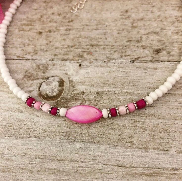 "This lovely choker is made out of white Czech glass beads and light pink color glass beads,raspberry beads,pink beads with a pink mother of pearl bead, I have a size 13\"on with an extension" Pearl Necklace Choker, Boho Choker, Jewelry Pearl, Mother Of Pearl Necklace, Light Pink Color, Pink Beads, Necklace Choker, Pearl Choker, Beaded Choker