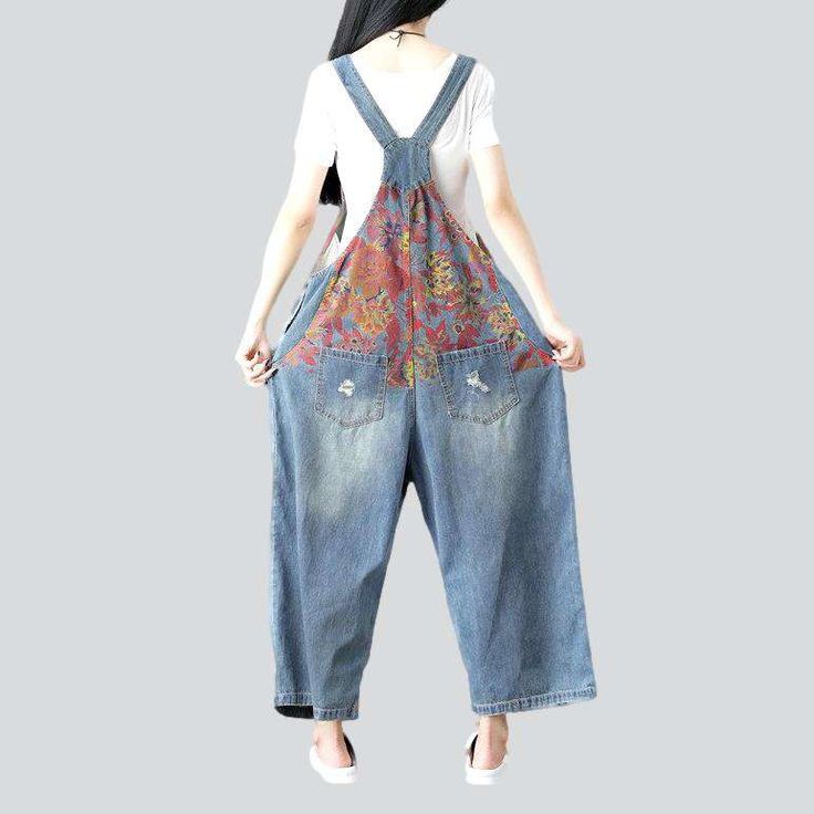 Elevate your city style with our 2023 Spring-Summer floral print women's denim jumpsuit! This baggy. painted jumpsuit features suspenders closure. making it the perfect statement piece for your wardrobe.Distinctive Features: Street Style: Step up your street style game with this chic and edgy jumpsuit. Floral Print: A patterned print. perfect for the summer season. Baggy Fit: The loose fit ensures you stay comfy all day long. Suspenders Closure: A unique twist on a classic. with an adjustable fi Bohemian Jumpsuits And Rompers With Pockets For Spring, Bohemian Overalls With Pockets For Spring, Bohemian Cotton Overalls For Spring, Trendy Jumpsuits And Rompers With Suspenders For Spring, Bohemian Summer Overalls With Pockets, Casual Jumpsuits And Rompers With Suspenders For Spring, Casual Floral Print Overalls For Spring, Spring Cotton Jumpsuits And Rompers With Suspenders, Trendy Summer Denim Jumpsuit With Suspenders