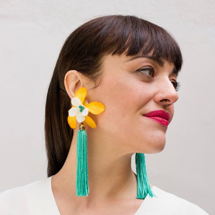 Get ahead of spring, and buy this flower statement earrings for your colorful outfits. These long statement tassel earrings is the perfect accessory for a great spring outfit. Bold and delicacy go together in this flower and tassel earrings. If your wedding is this season, I can create for you the earrings with the ideal color to match with bridesmaids dresses. IMPORTANT INFORMATION Process time -2-5 business days For further information about the shipping to your country, please consult the Sho Spring Beach Tassel Earrings, Bohemian Tassel Earrings With Fringe For Spring, Spring Beach Tassel Drop Earrings, Elegant Yellow Tassel Earrings For Summer, Bohemian Dangle Tassel Earrings For Spring, Bohemian Fringe Earrings For Spring, Spring Beach Earrings With Fringe, Spring Bohemian Fringe Earrings, Chic Summer Jewelry With Tassels