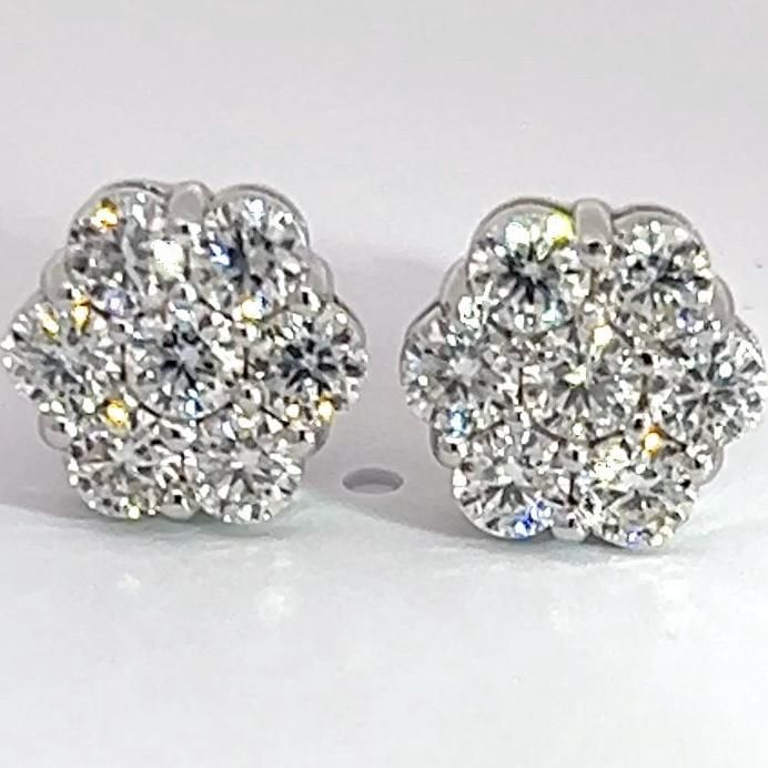 * Size - 8mm * Precious metal - 92.5 sterling silver   * Gemstone - Moissanite  * Carat weight - 2 carats each ear - total weight 4 carats  * Setting - Prong set by hand  * Closure type - Screw Backs  * Guarantee you These are one of the most beautiful earrings you would ever wear ! The shine truly speaks for itself , lots of stones were set in a flower style setting giving you crazy amounts of fire and shine ! We have these earrings IN HAND and ready to ship out SAME DAY ! https://www.youtube.c Round Platinum Cluster Earrings With Diamond Cut, White Gold Moissanite Cluster Earrings, Diamond Cluster Earrings For Anniversary, Gia Certified Diamond Cluster Earrings, Platinum Cluster Earrings With Prong Setting As Gift, White Gold Round Cut Cluster Earrings For Anniversary, Gia Certified Silver Diamond Earrings In Sterling Silver, Dazzling Round Cluster Earrings For Anniversary, Diamond White Platinum Cluster Earrings For Anniversary