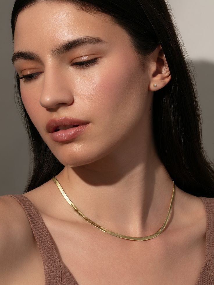 Horizon Herringbone Chain Necklace in Gold | Uncommon James Snake Chain Necklace Choker For Gift, Snake Chain Choker Necklace Perfect For Gifts, Herringbone Choker Necklace For Gift, Gift Herringbone Choker Necklace, Classic Gold Snake Chain Necklace For Everyday, Everyday Gold Plated Snake Chain Necklace, Gold Plated Snake Chain Necklace For Everyday, Everyday Gold Plated Herringbone Necklace, Elegant Herringbone Necklace With Adjustable Snake Chain