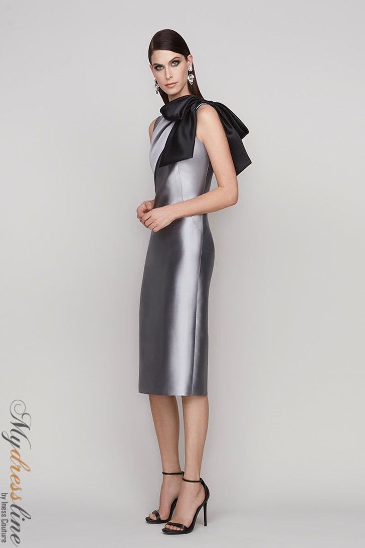 Looking for a sleek and sophisticated sleeveless dress? Check out the Frascara 4112. This stunning dress features a draped bodice with a bow at the shoulder, and a sheath skirt silhouette with a back vent. It's made from 51% silk and 49% wool, and it's satin-lined for a luxurious feel. Plus, it has a hidden back zipper for easy on and off. Satin Sleeveless Evening Dress For Black-tie Events, Chic Satin Dress With Detachable Bow, Chic Evening Dress With Tie Back For Gala, Satin Dress With Fitted Bodice For Black-tie Events, Chic Tie-back Evening Dress For Gala, Chic Tie Back Evening Dress For Gala, Formal Sleeveless Dress With Satin Bow, Elegant Silk Evening Dress For Gala, Elegant Sleeveless Evening Dress For Gala