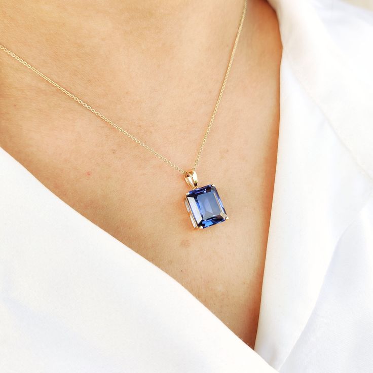 This stunning pendant is set in 14K Solid Yellow Gold studded with Blue Sapphire Hydro in classic prong setting. It is an unique gemstone pendant for nearly every occasion and is completely hassle-free jewelry. ◾ITEM DETAILS * Gem: Blue Sapphire Hydro * Gem Size: 10X12mm * Gem Shape: Octagon cut * Gem Weight: 8.50 carats * Gold Purity: 14KT  * Gold Weight: 0.97gram * Total Weight of the Pendant: 2.69 gram The Gold purity is guaranteed and it comes with authentic 14KT gold hallmark. Since my item Emerald Cut Blue Necklace As A Gift, Blue Emerald Cut Necklace Fine Jewelry, Emerald Cut Blue Necklace For Gift, Blue Emerald Cut Gemstone Necklace, Blue Emerald Cut Fine Jewelry Necklace, Blue Emerald Cut Necklace For Gift, Blue Gemstone Accented Necklace For Gifts, Blue Necklace With Gemstone Accents As Gift, Blue Necklace With Gemstone Accents For Gift